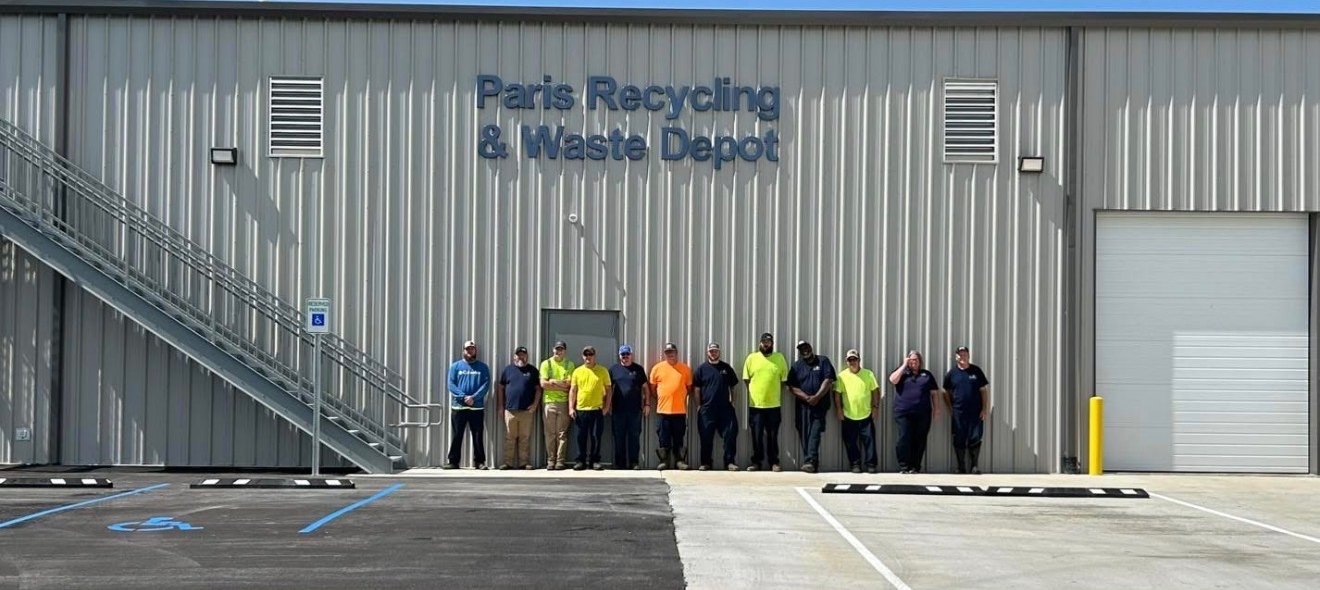 The Paris Recycling & Waste Depot crew standing in front of the depot building at 300 Thornberry Way.
